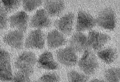 From a Sphere to a Tetrahedron: A Novel Quantum Dot Growth Strategy for SWIR Detection