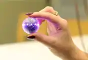 Meet the Qbead: A Qubit in the Palm of Your Hands